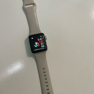 Apple Watch Series 3 - 38mm in EUC. No cracks just minimal scratching